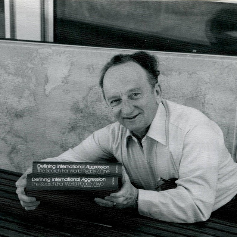Ben posing with his book, "Defining International Aggression," unknown date (1970's)
