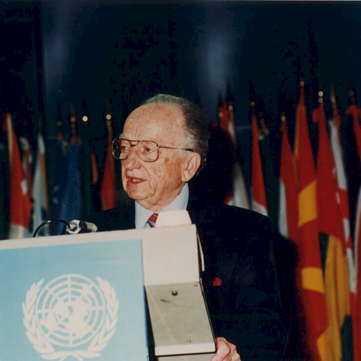 Ben speaking at a United Nations Diplomatic Conference in Rome, June 1998