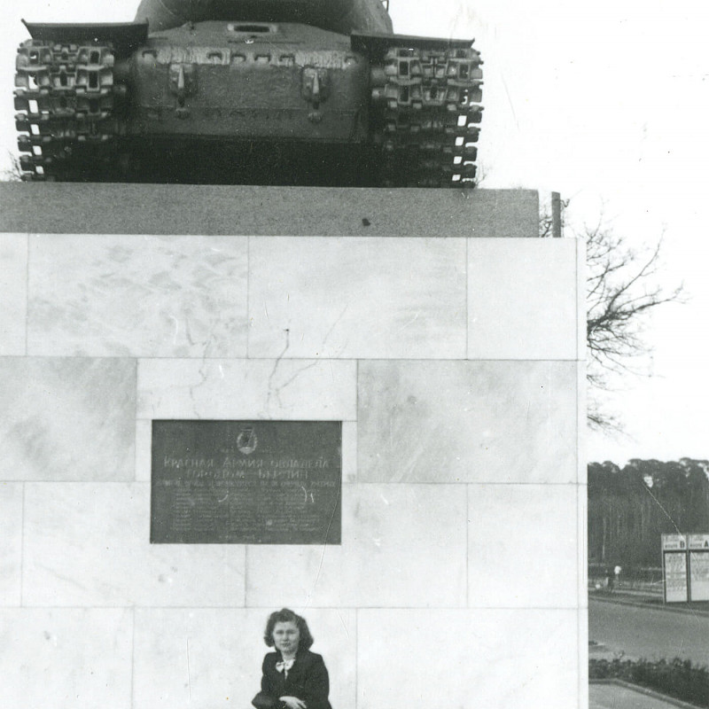 Gertrude sitting by a Russian monument in Berlin, 1947